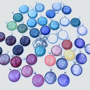 Hand painted 25mm glass pendant with a 24” ball style chain.